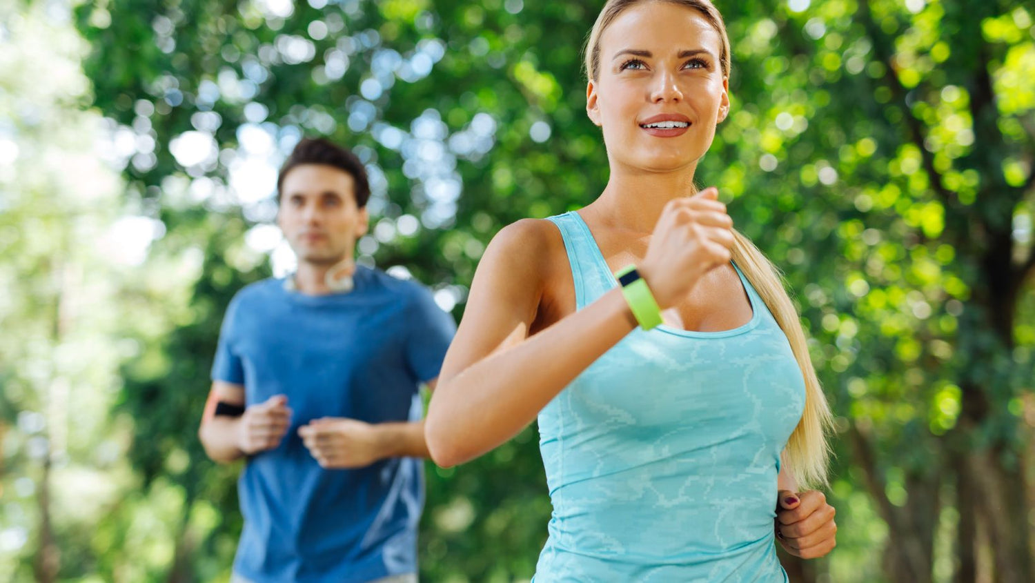 Delighted nice woman jogging in the morning
