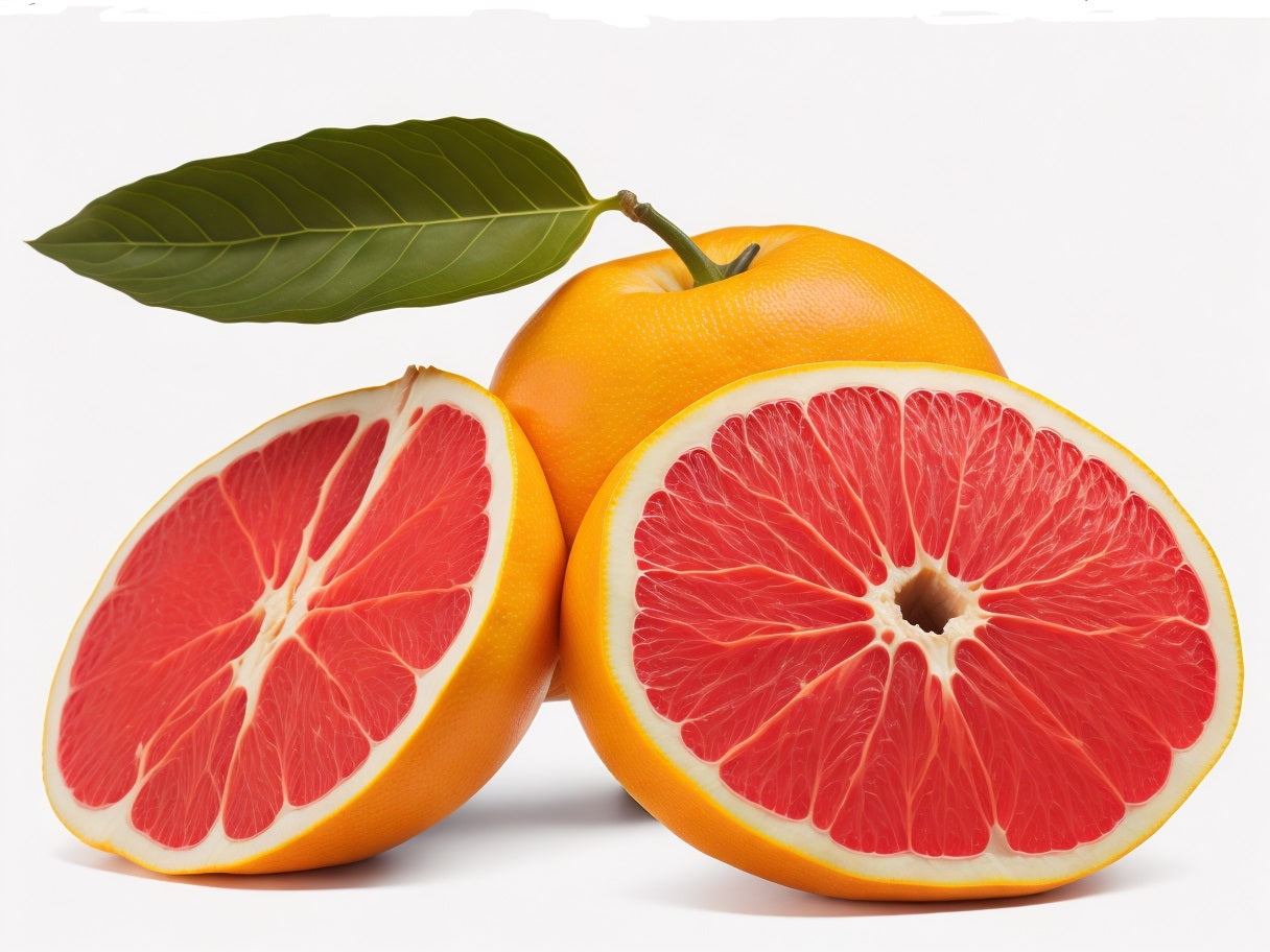 A juicy grapefruit cut in half, revealing its vibrant pink and yellow hues
