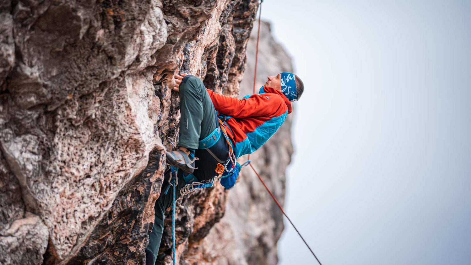 Man Climbing a Rock Mountain