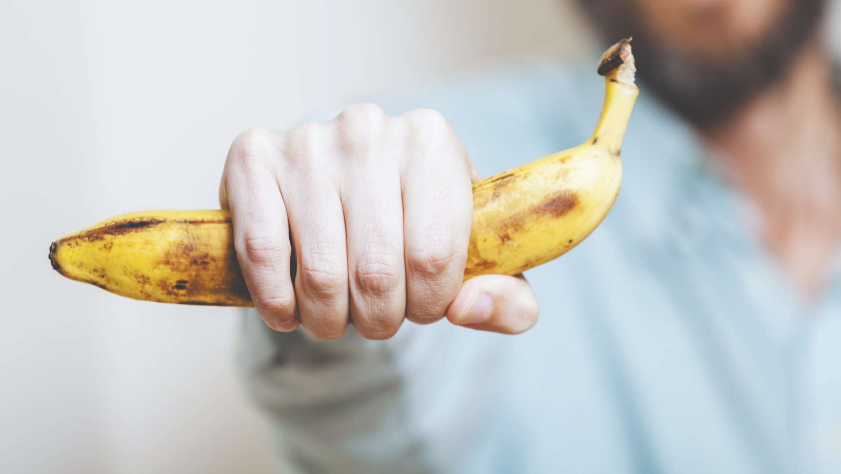 Man holding banana