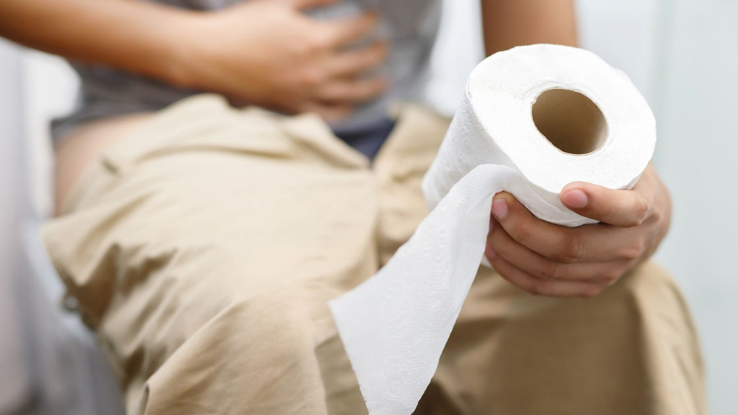 Man suffers from diarrhea hand hold tissue paper roll
