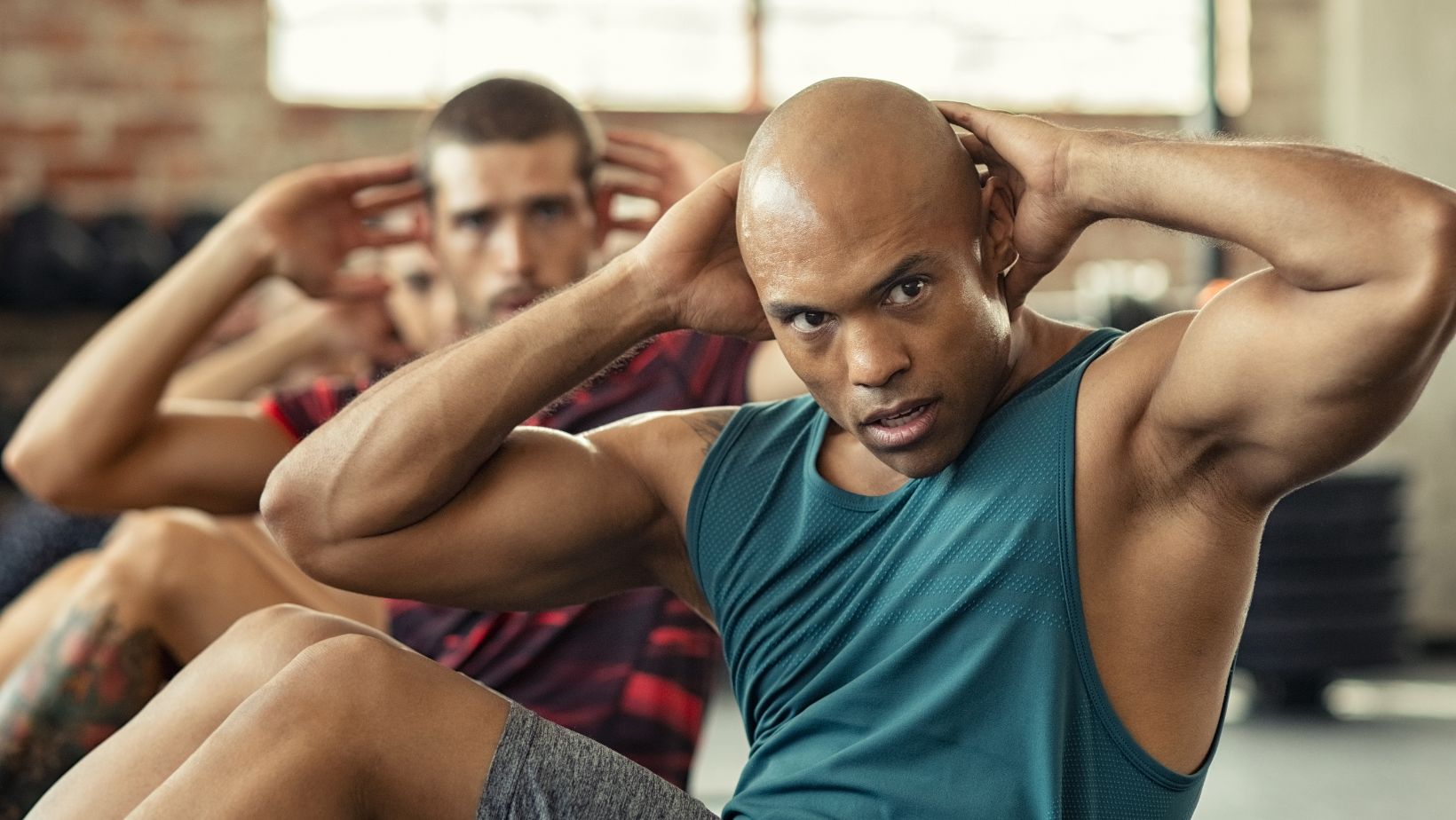 Men Doing Sit Ups Workout