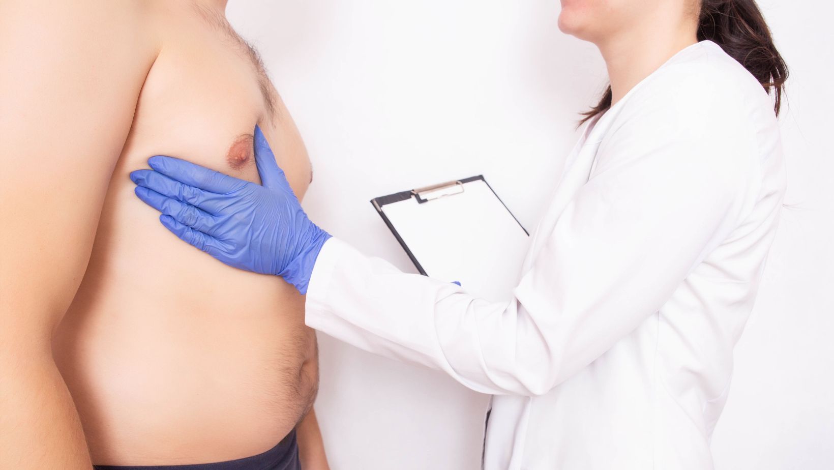 fat man checking up his man boobs